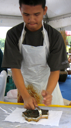 Applying the hot wax with the cap